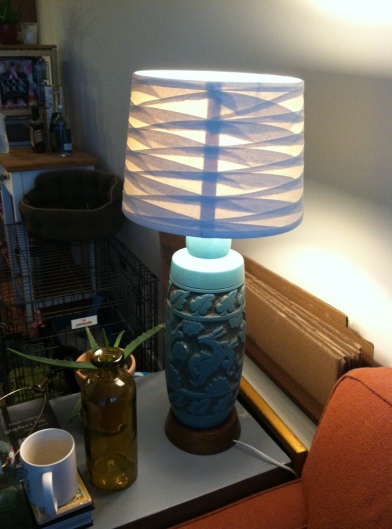 my favorite lamp from a flea market. of course I never bought a lamp shade for it. Com-pro-mise.